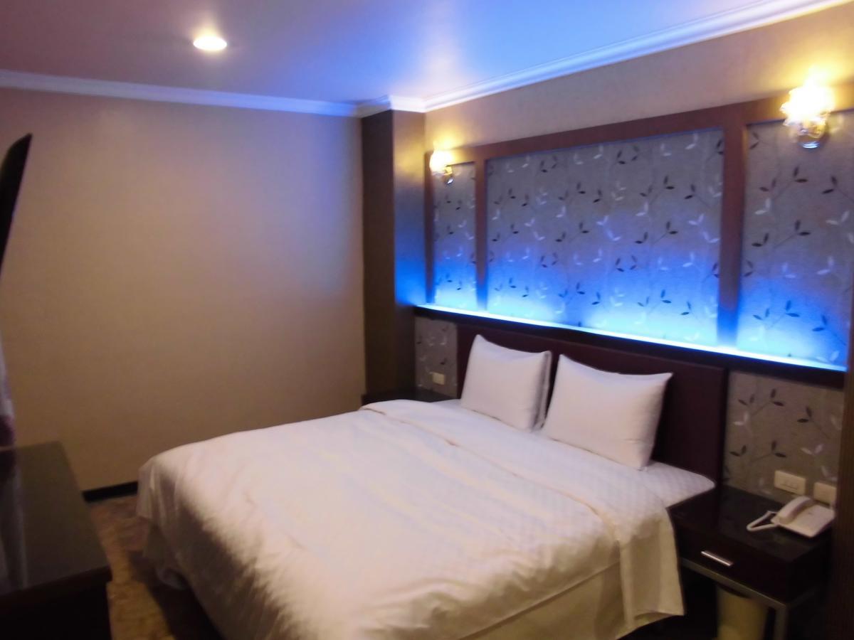Отель 欣悅商務旅店 Тоуфэнь Экстерьер фото