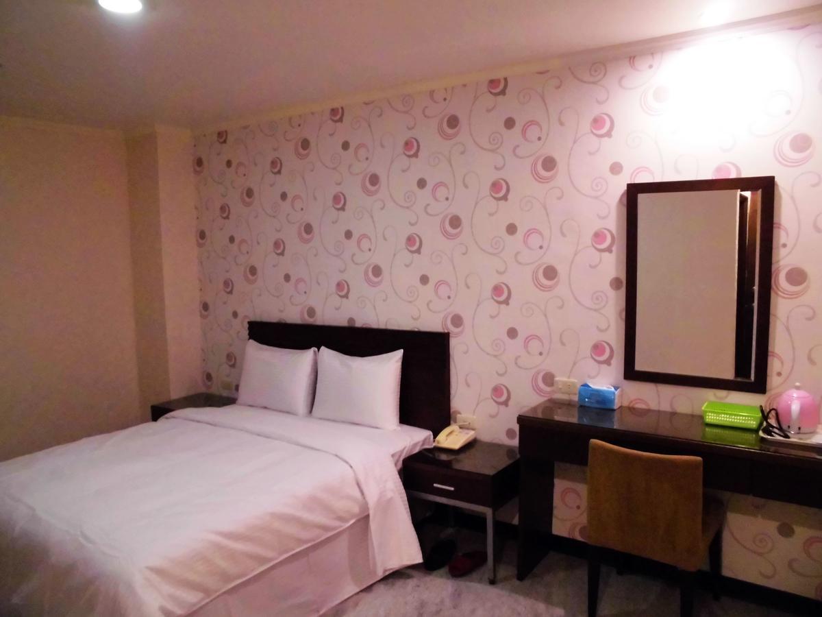 Отель 欣悅商務旅店 Тоуфэнь Экстерьер фото