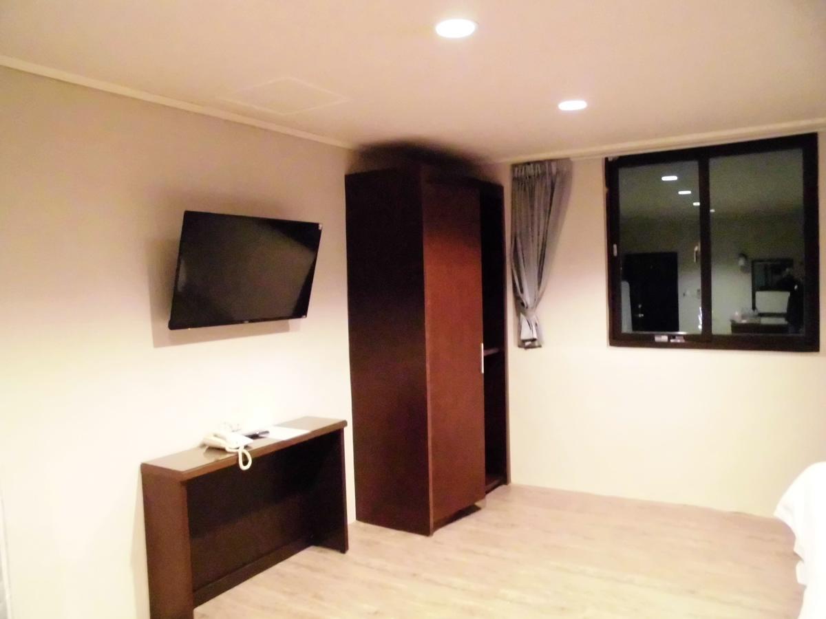 Отель 欣悅商務旅店 Тоуфэнь Экстерьер фото